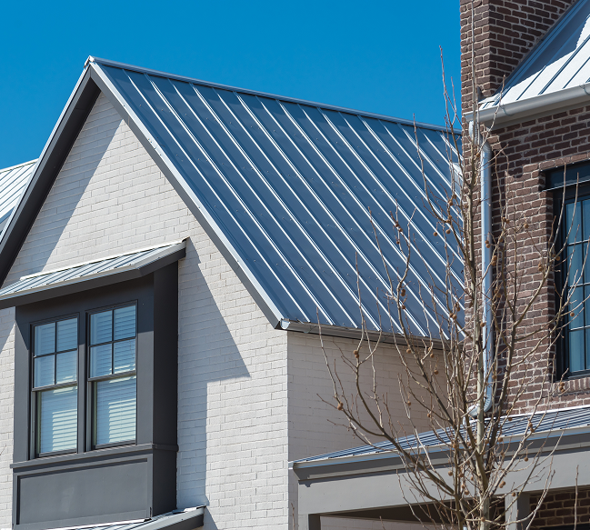 Metal roof on brick house
