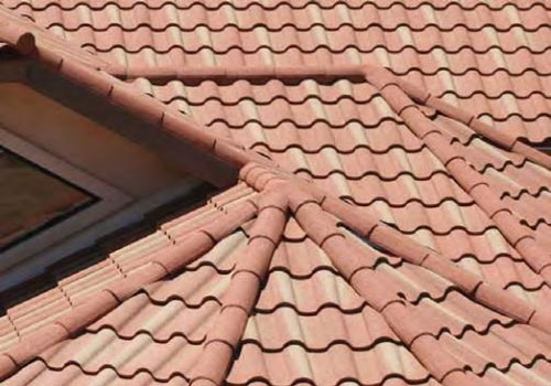 Stone coated steel tiles on a roof